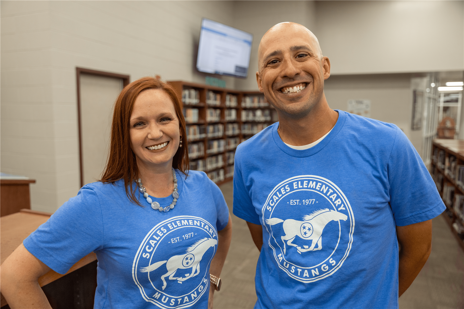 Principal and Assistant Principal smiling